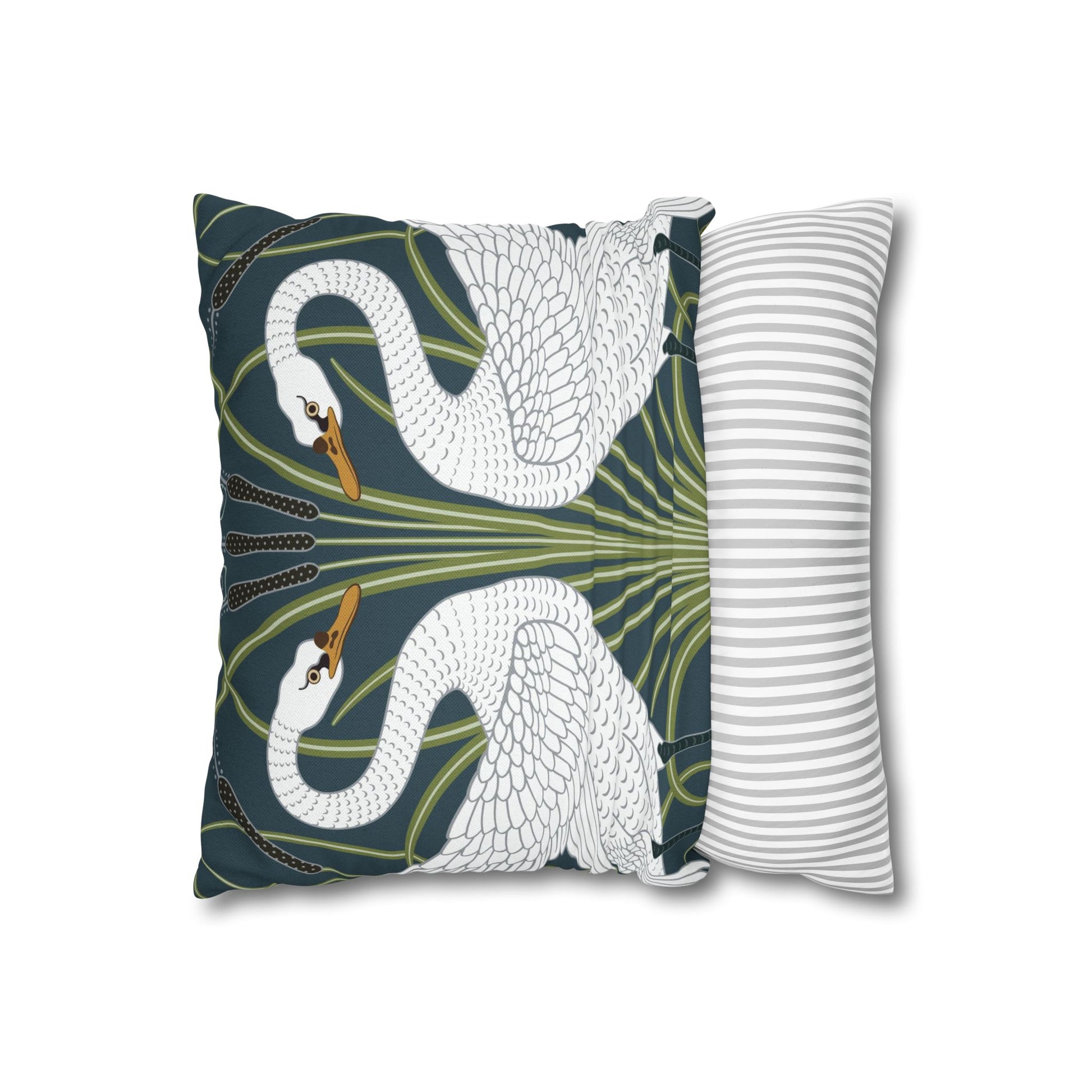 Decorative pillow with swan design on one side and striped pattern on the other, on a white background.