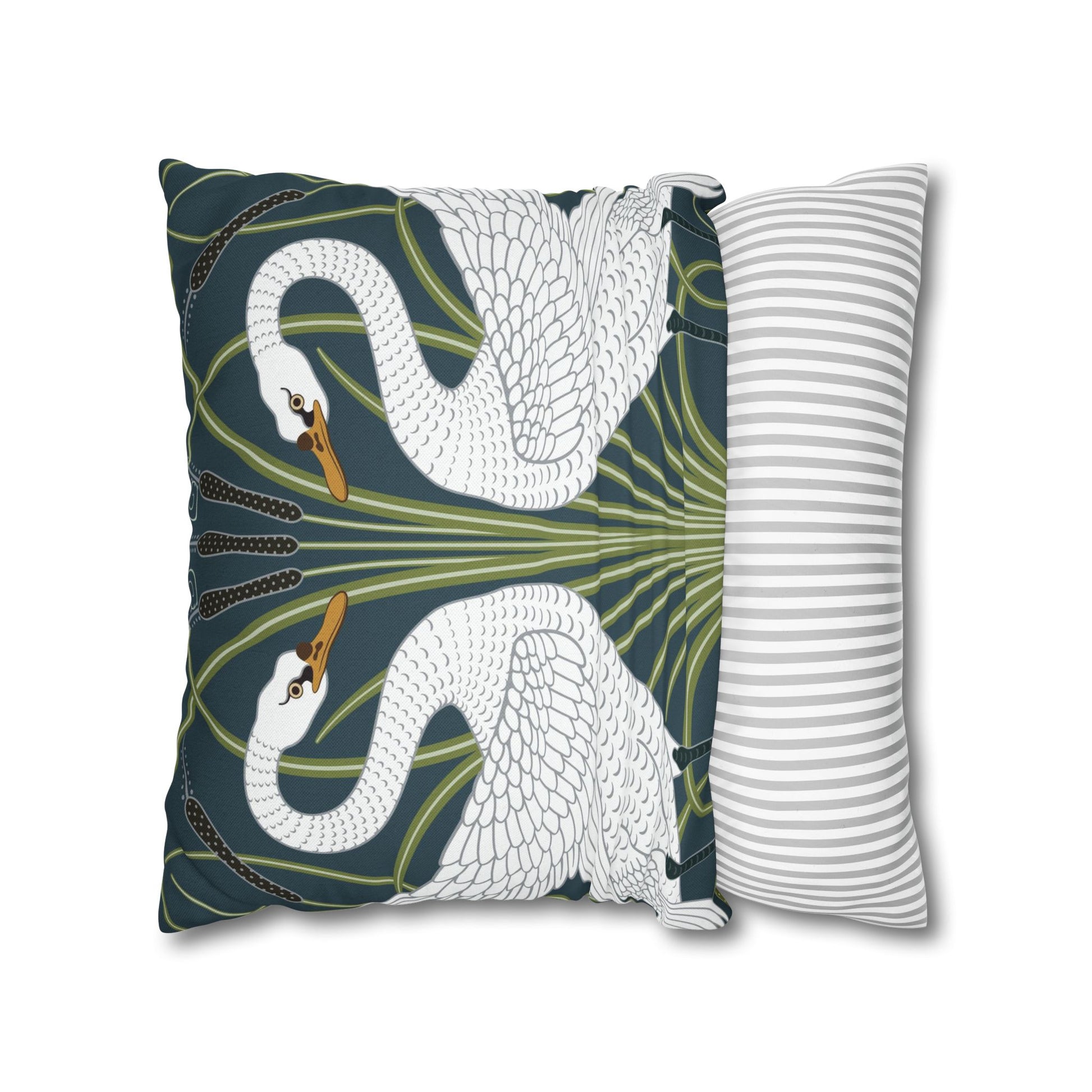 Decorative pillow with swan design on a white background