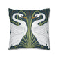 Decorative pillow with two swans on a dark blue background