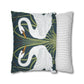 Decorative pillow with swan design and another with striped pattern on a white background