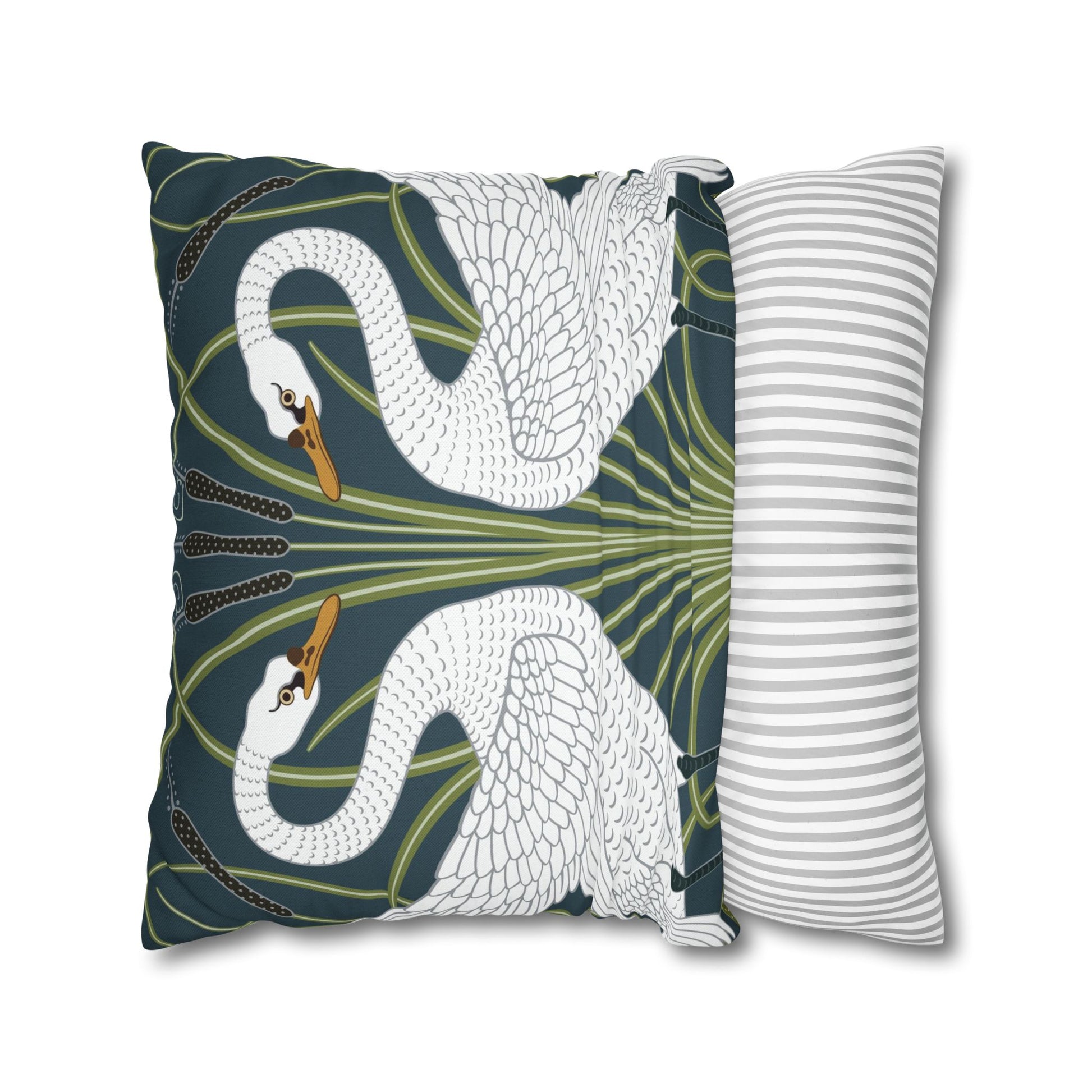 Decorative pillow with swan design and another with striped pattern on a white background