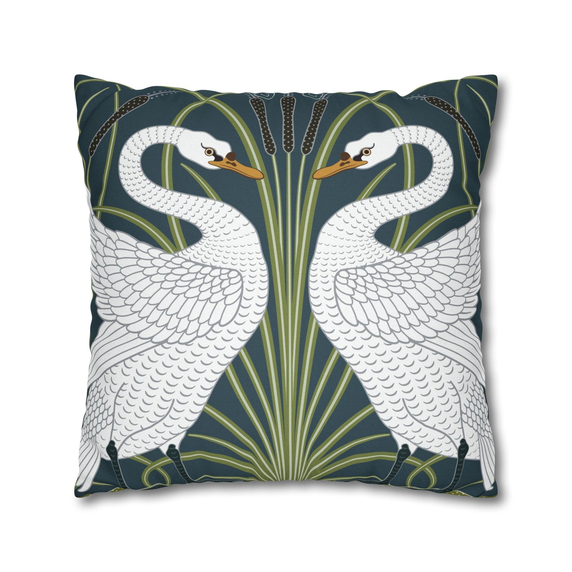 Decorative pillow with swan design on a dark blue background