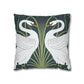 Decorative pillow with swan design on a dark blue background