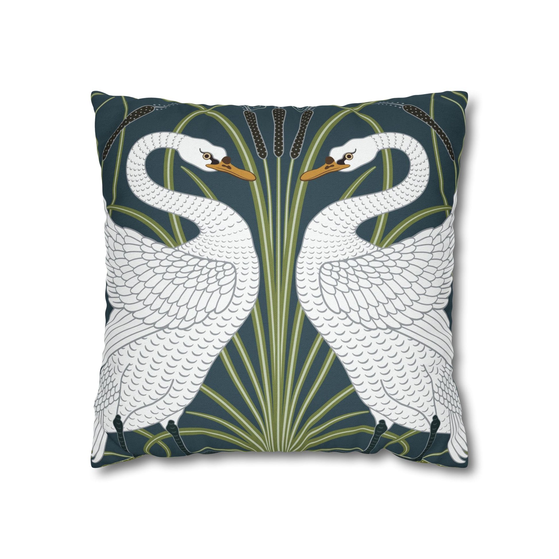 Decorative pillow with swan design on a dark blue background