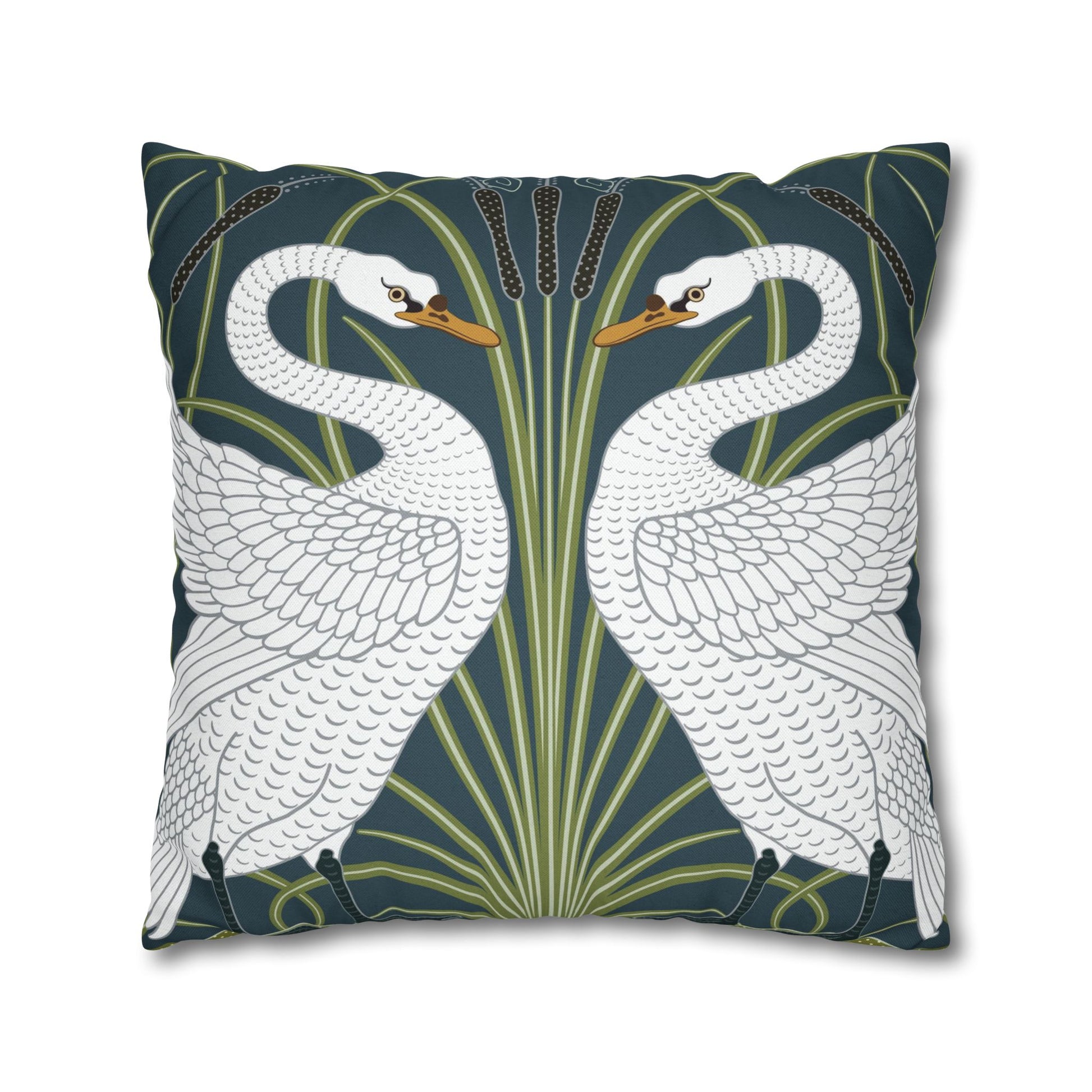 Decorative pillow with swan design on a dark blue background