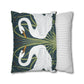 Decorative pillow with swan design and another with striped pattern on a white background