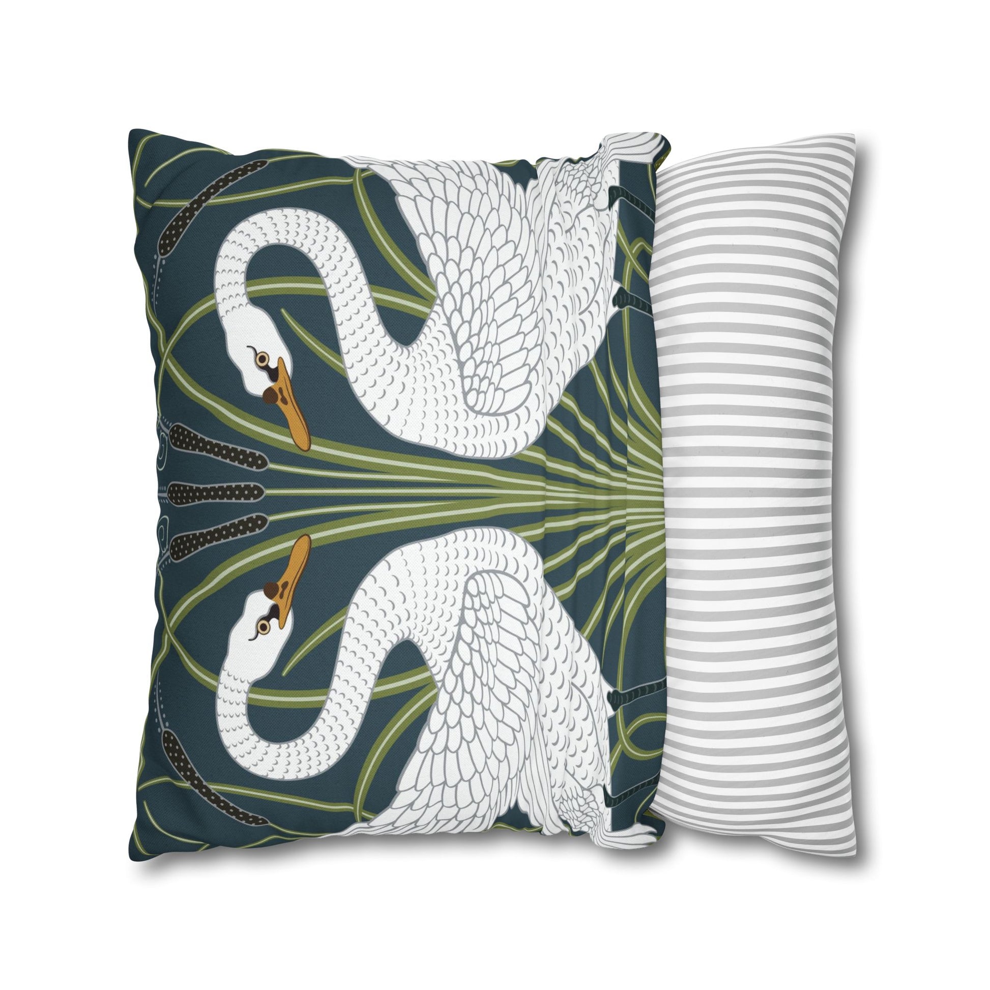 Decorative pillow with swan design and another with striped pattern on a white background