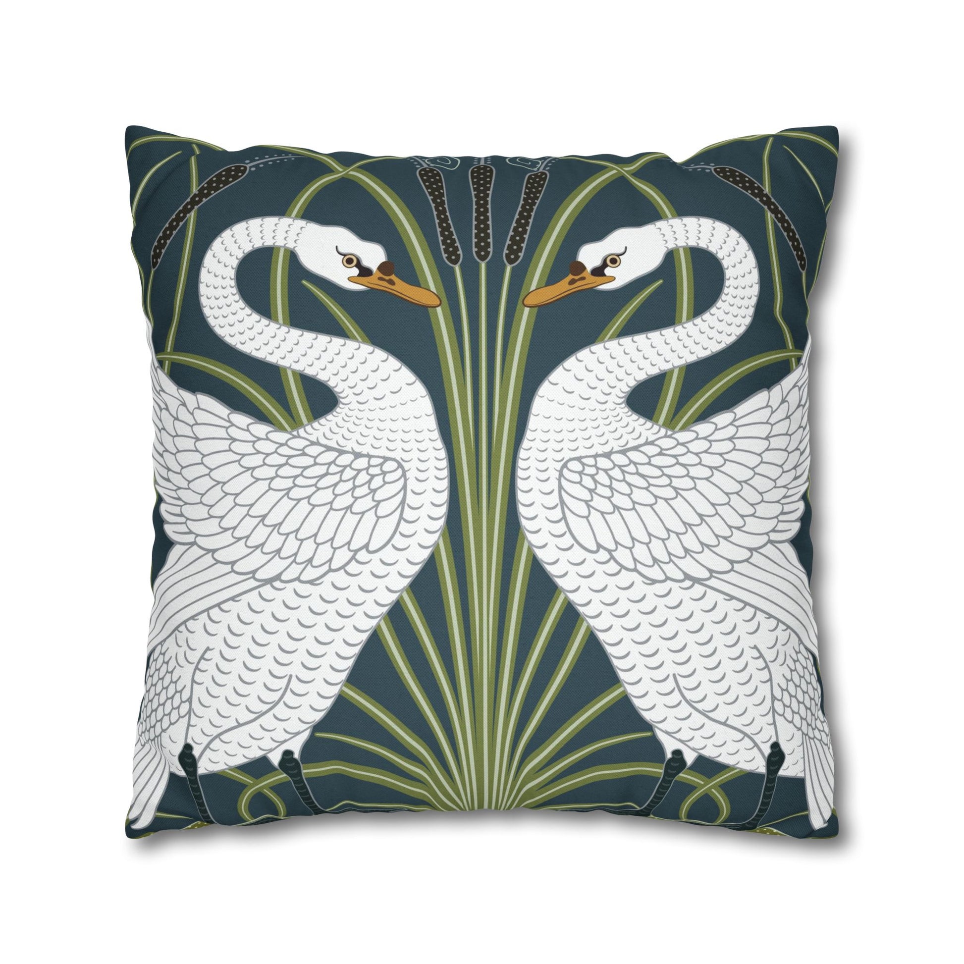 Decorative pillow with swan design on a dark blue background