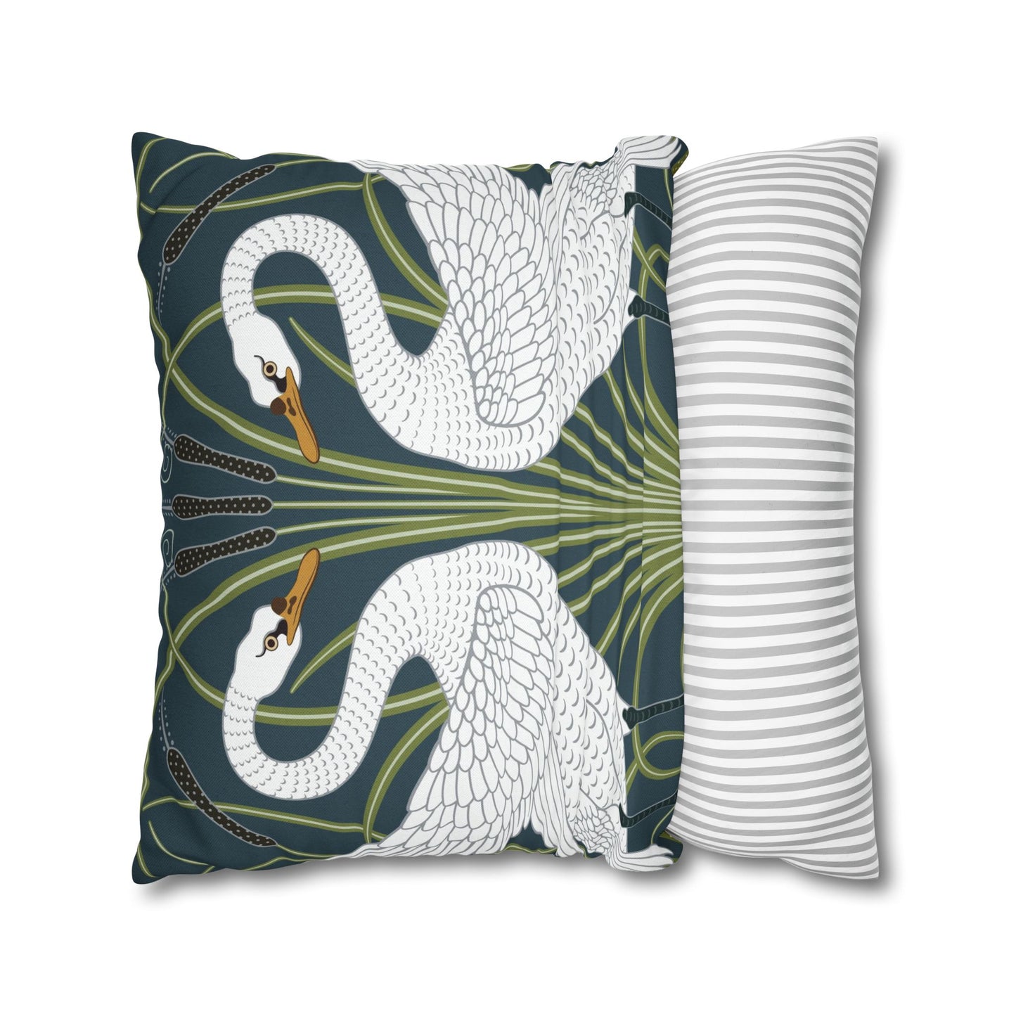 Decorative pillow with swan design next to a striped pillow on a white background