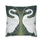 Decorative pillow with swan design on a dark green background