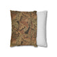 Decorative pillow with leaf pattern next to a striped pillow on a white background