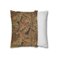 Decorative pillow with leaf pattern next to a striped pillow on a white background