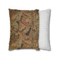 Decorative pillow with leaf pattern next to a striped pillow on a white background