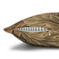 Decorative pillow with leaf pattern and zipper on a white background
