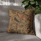 Decorative pillow with leaf pattern on a gray sofa