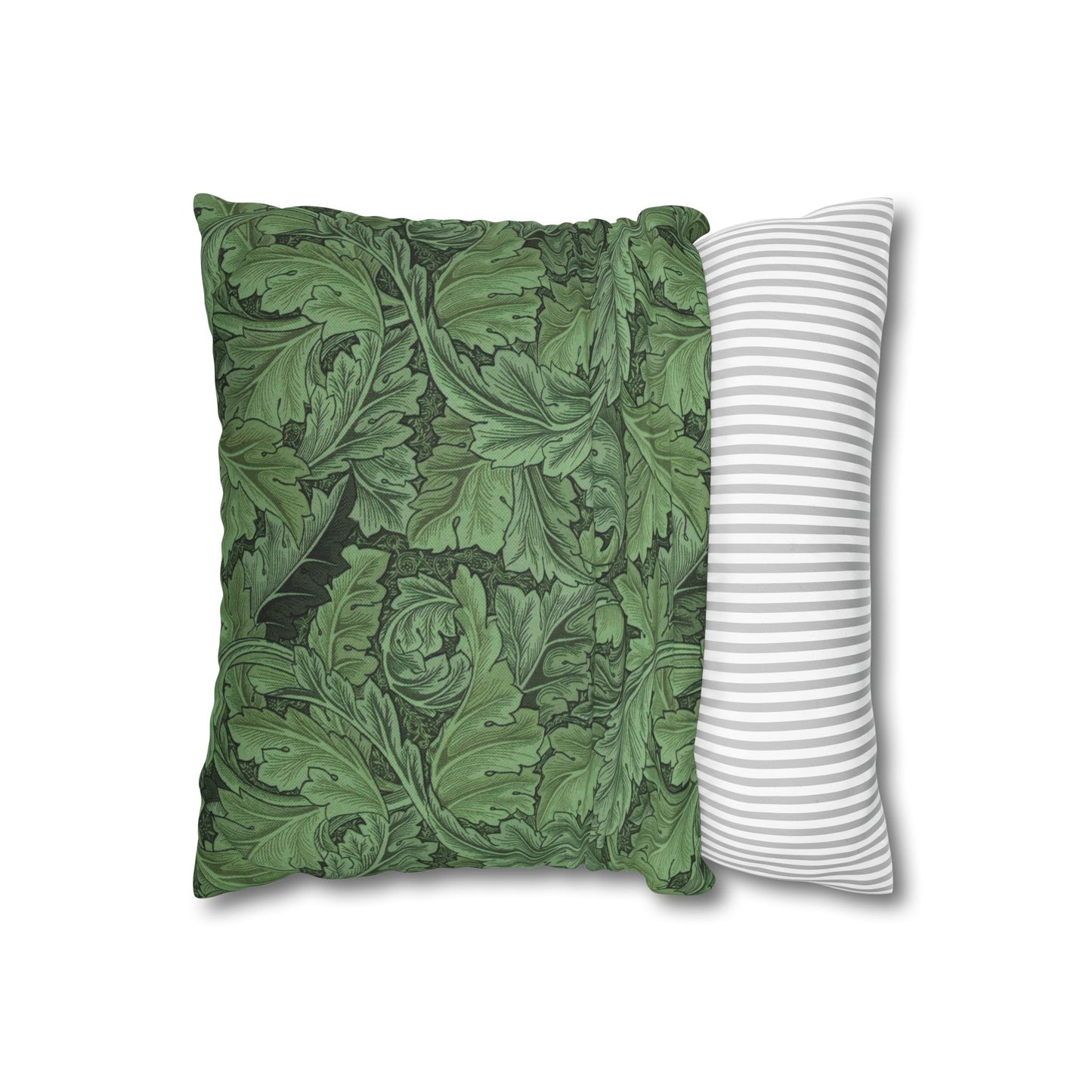 Green patterned pillow and white striped pillow on a white background