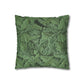 Green leaf-patterned pillow on a white background