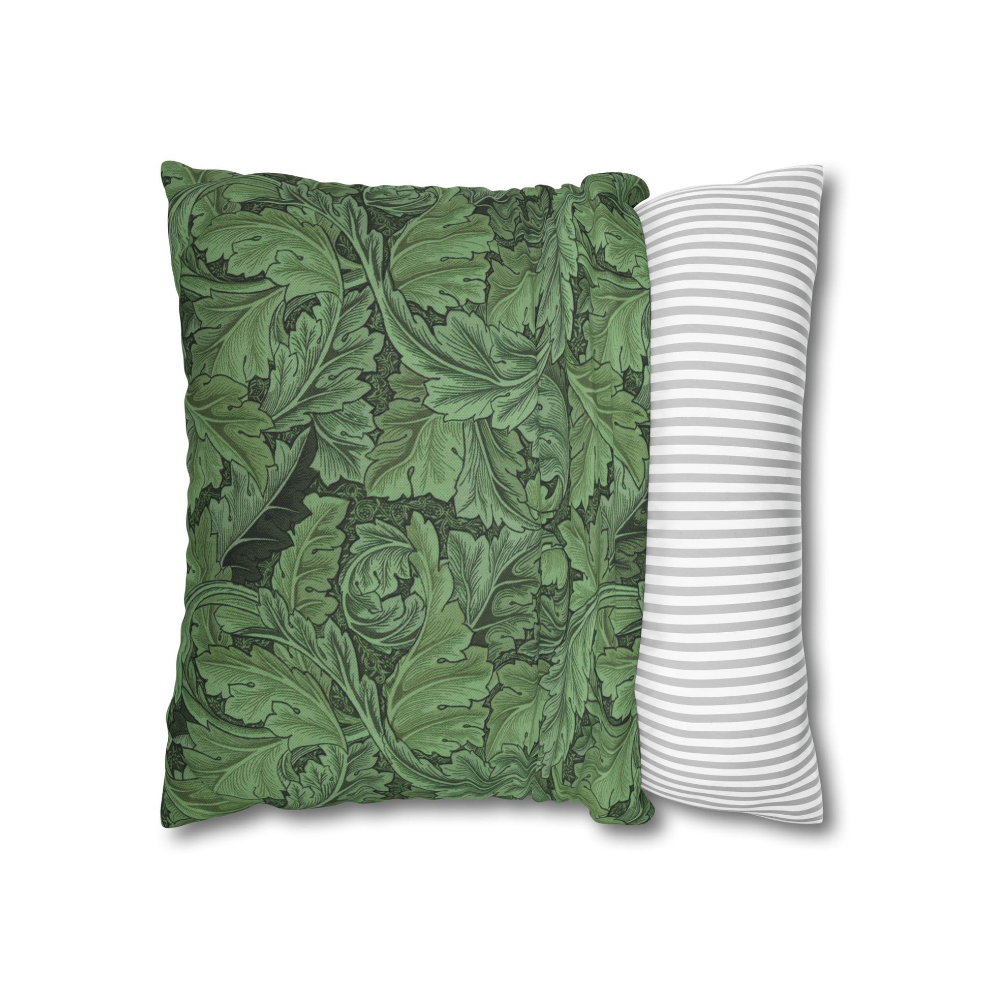 Two decorative pillows, one with green leaf pattern and the other with white and gray stripes, on a white background.