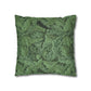 Green leaf-patterned pillow on a white background