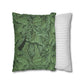 Two pillows, one with green leaf pattern and the other with white and gray striped pattern, on a white background.