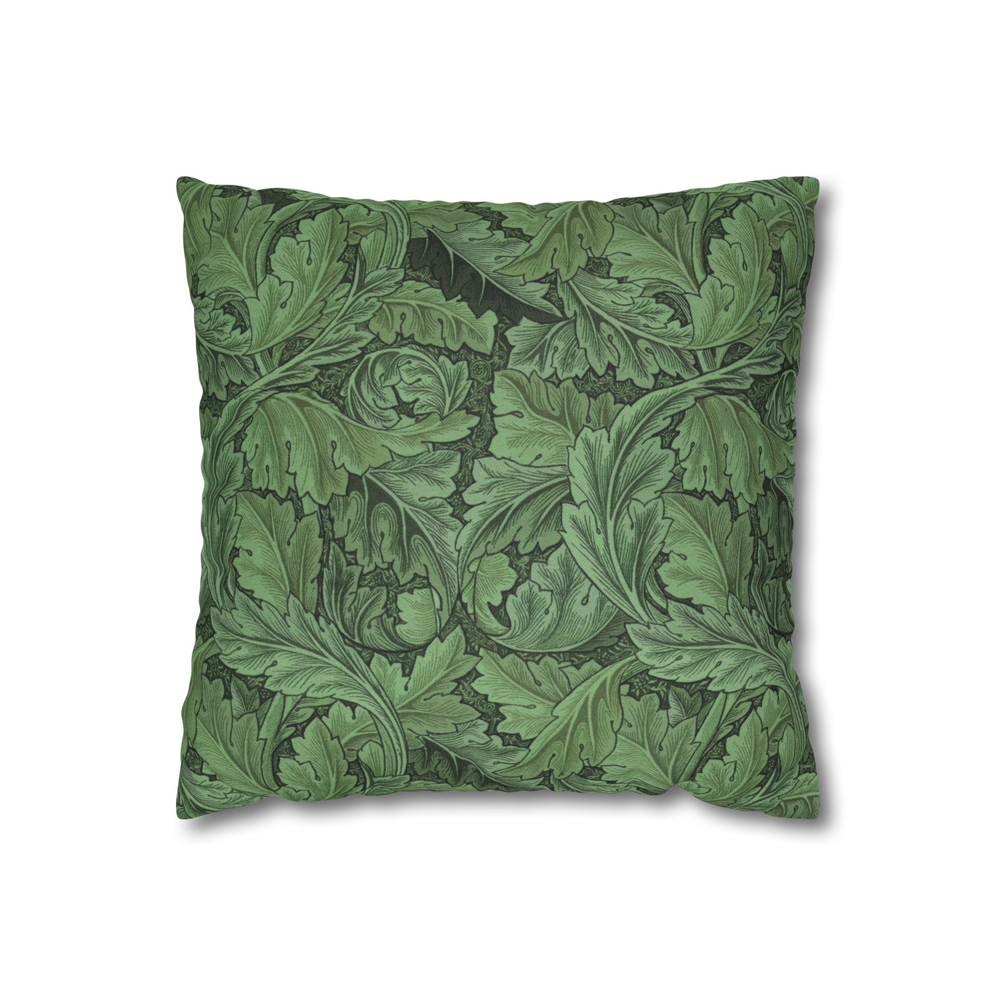Green leaf-patterned pillow on a white background
