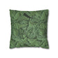 Green leaf-patterned pillow on a white background