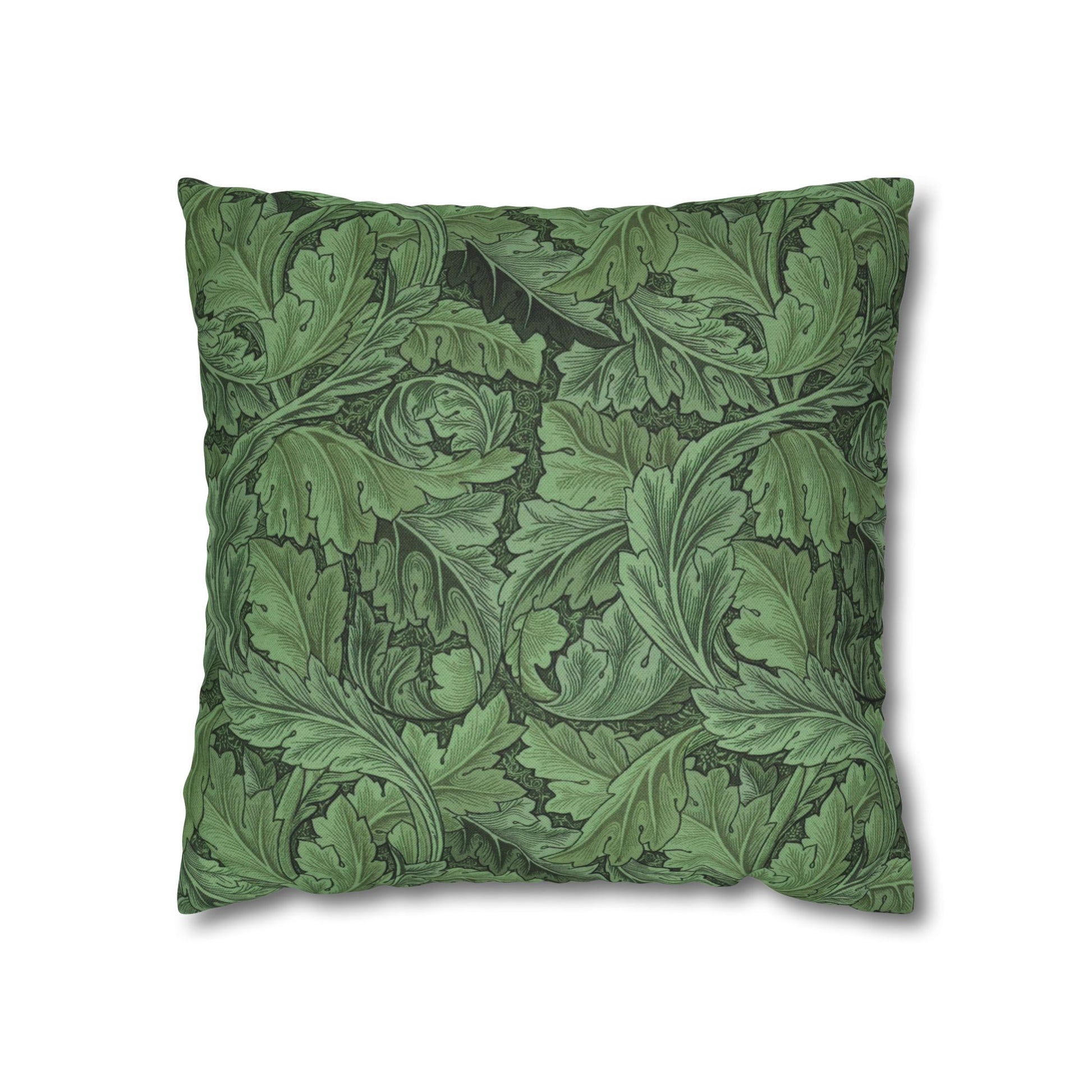 Green leaf-patterned pillow on a white background