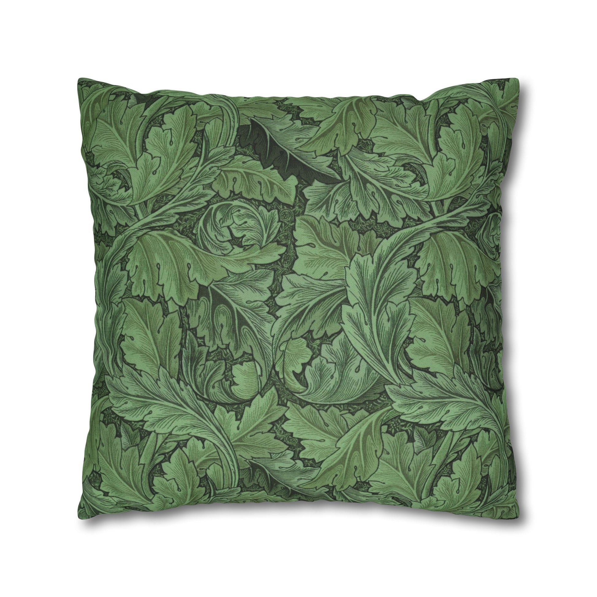 Green decorative pillow with leaf pattern on a white background