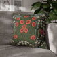 Decorative pillow with floral pattern on a gray sofa