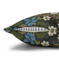 Decorative pillow with floral and feather design on a white background