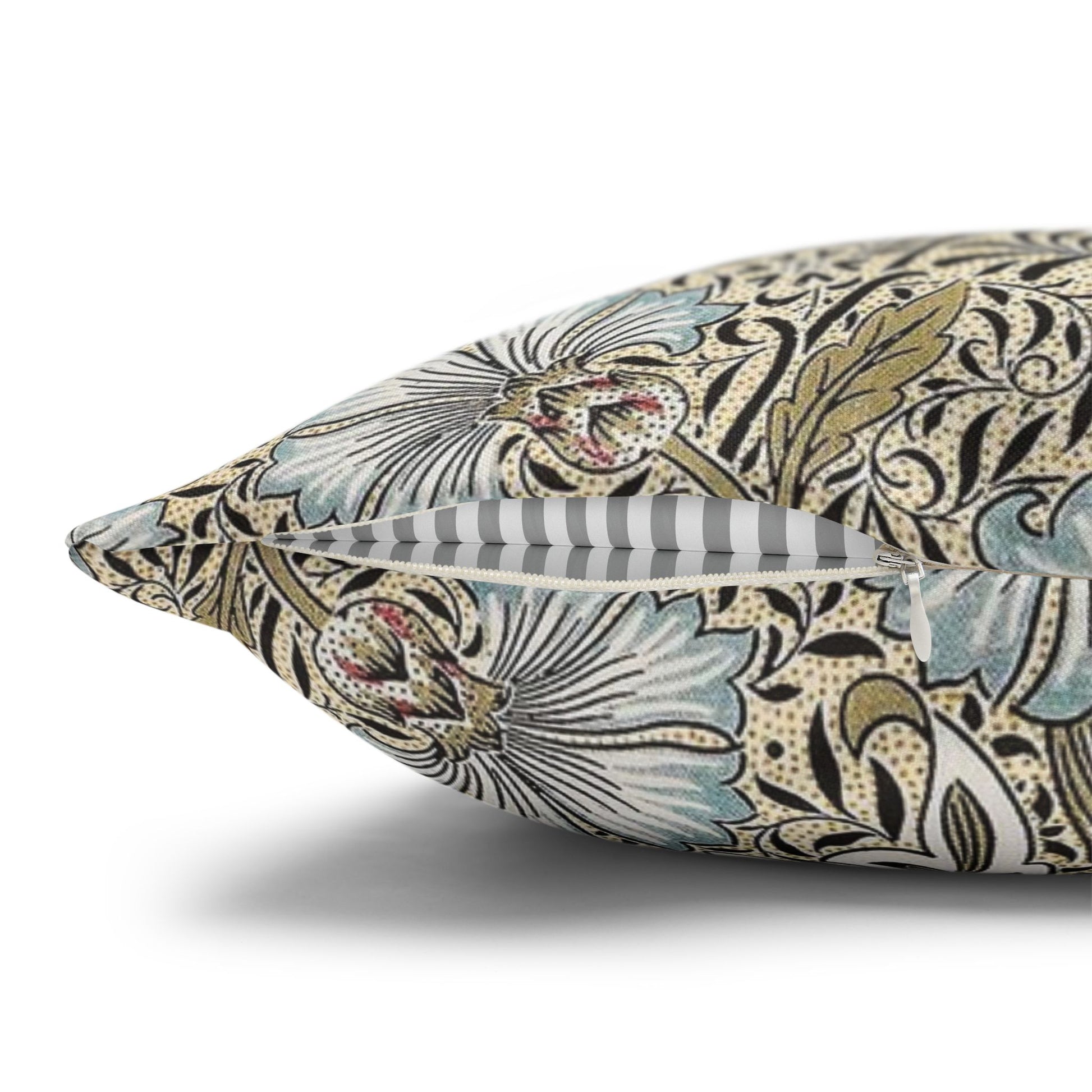 Decorative pillow with floral pattern on a white background