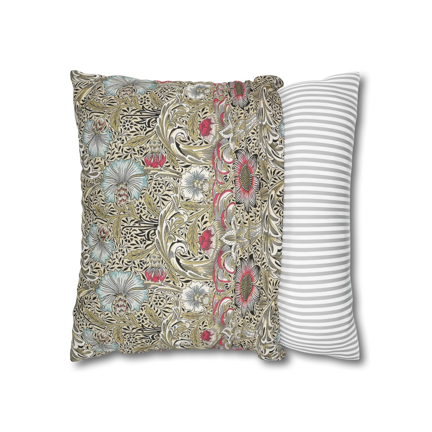Decorative pillow with floral pattern next to a striped pillow on a white background