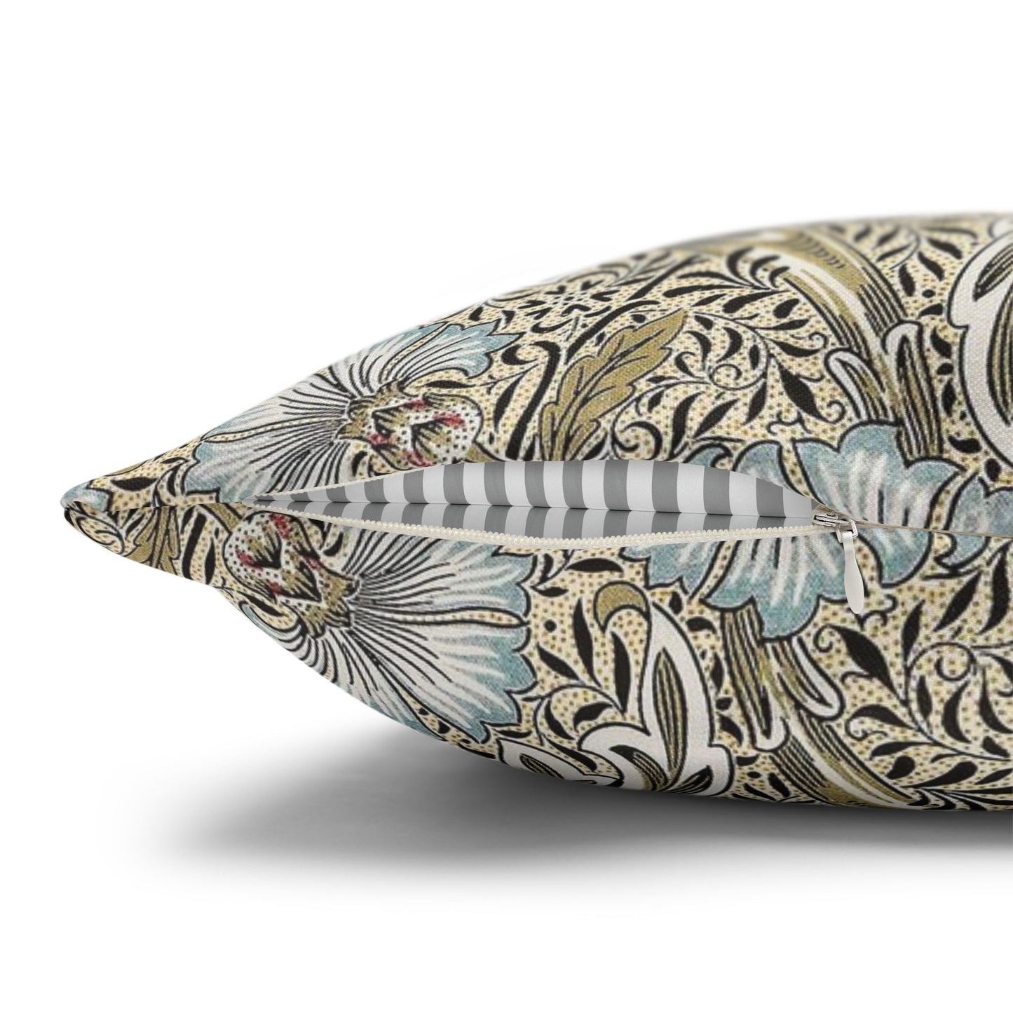 Decorative pillow with intricate floral pattern on a white background