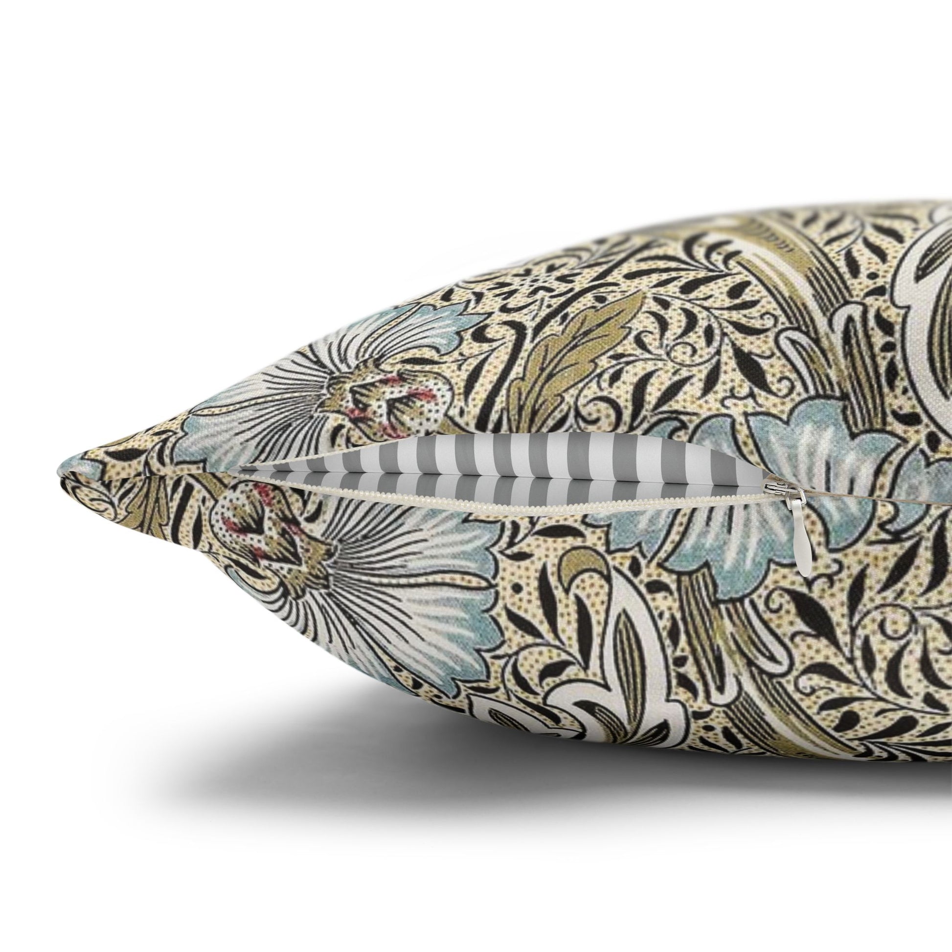 Decorative pillow with intricate floral pattern on a white background