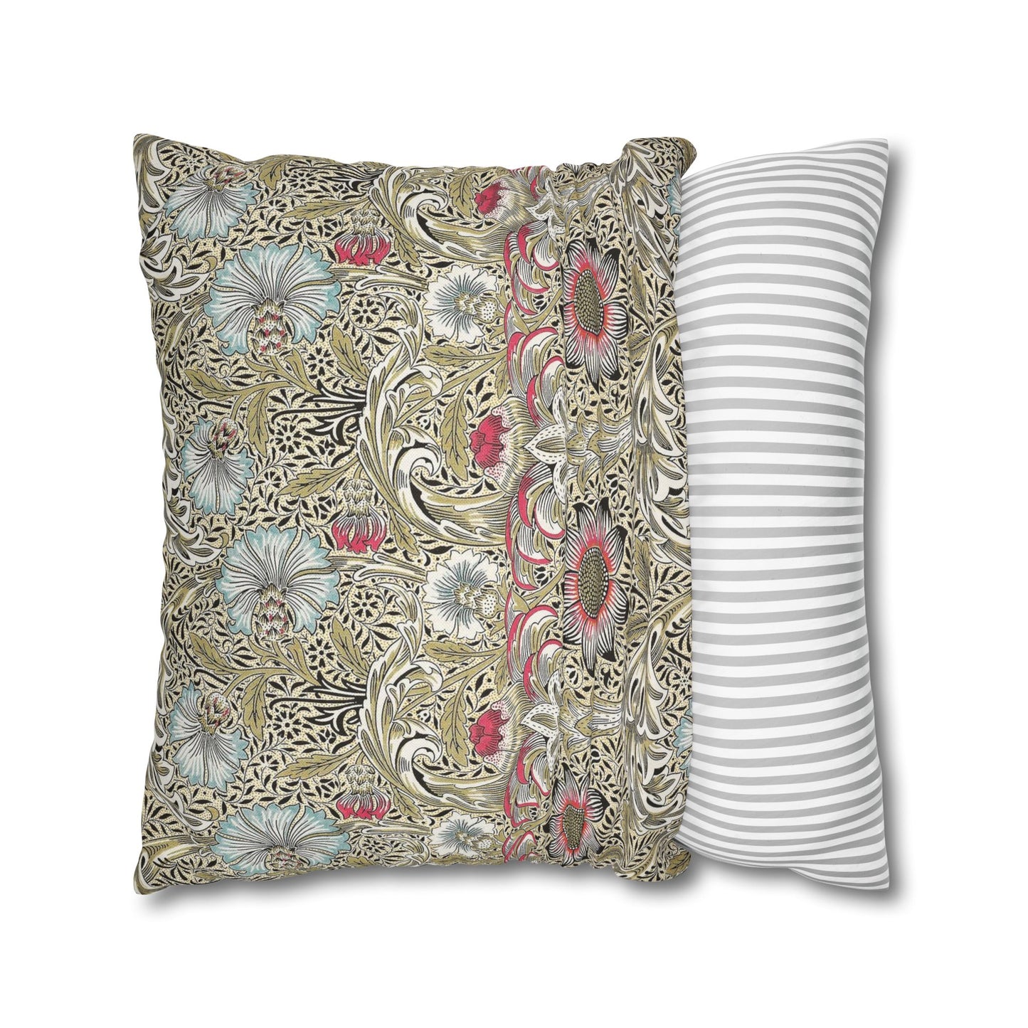 Decorative pillow with floral pattern next to a striped pillow on a white background