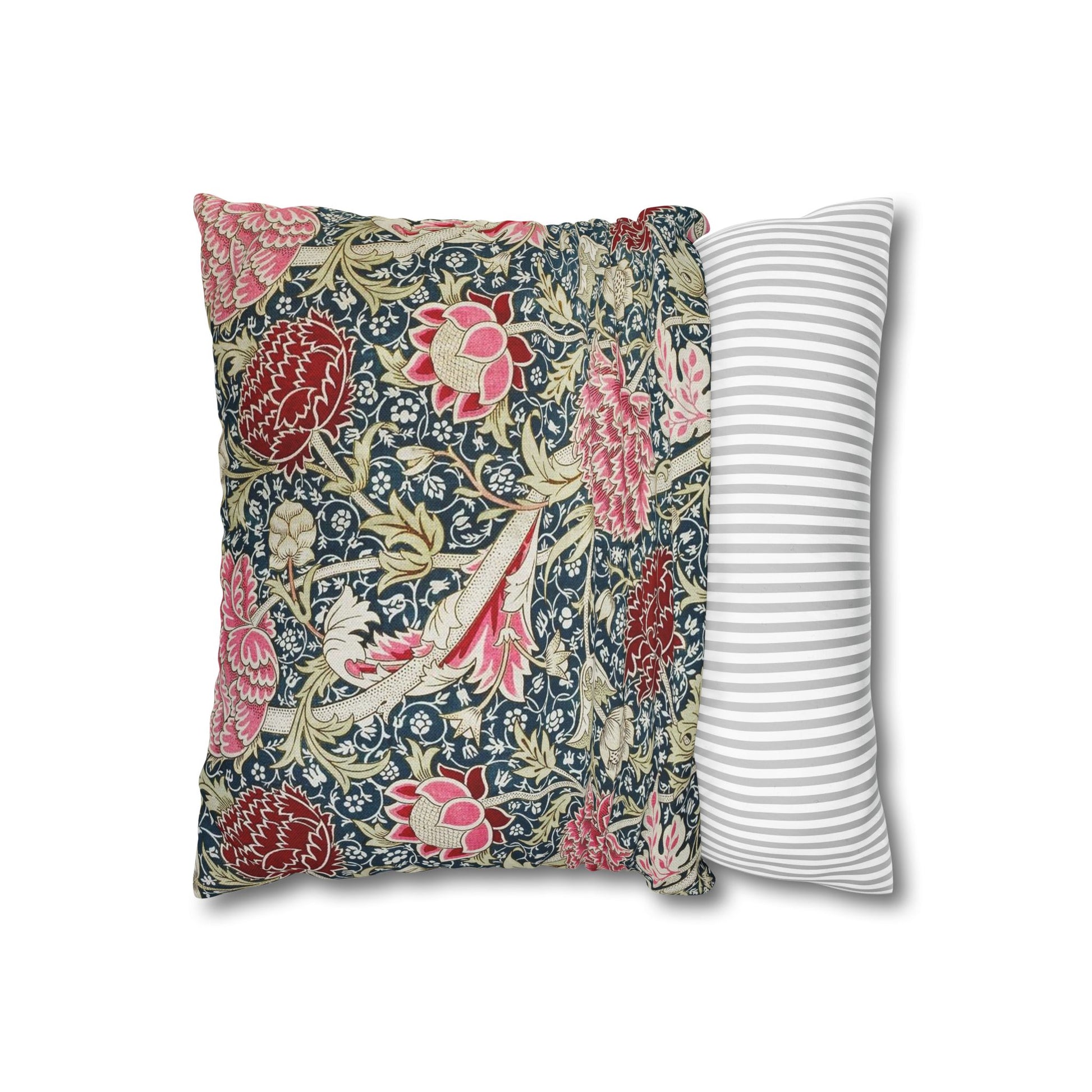 Floral-patterned pillow and a striped pillow on a white background
