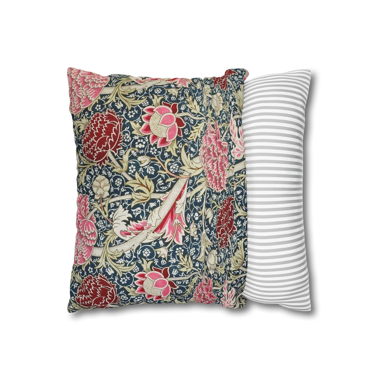 Two pillows, one with floral pattern and one with stripes, on a white background