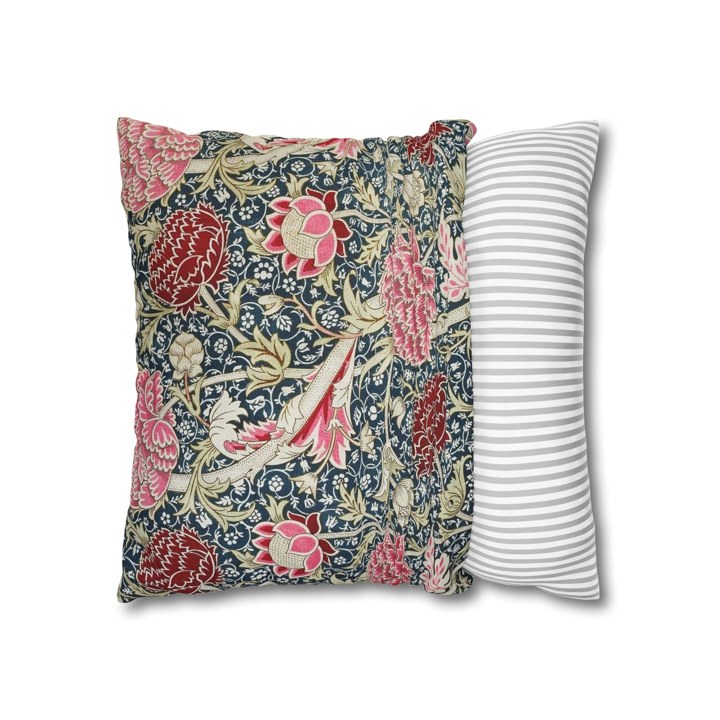 Floral patterned pillow and a striped pillow on a white background