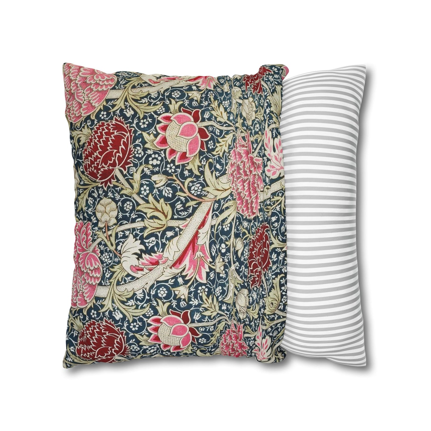 Floral patterned pillow and a striped pillow on a white background