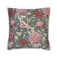Decorative pillow with floral and bird pattern on a white background