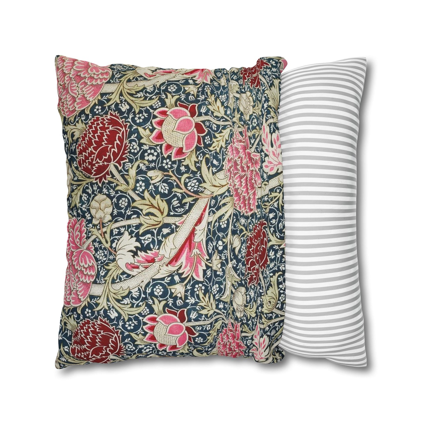 Floral-patterned pillow and a striped pillow on a white background