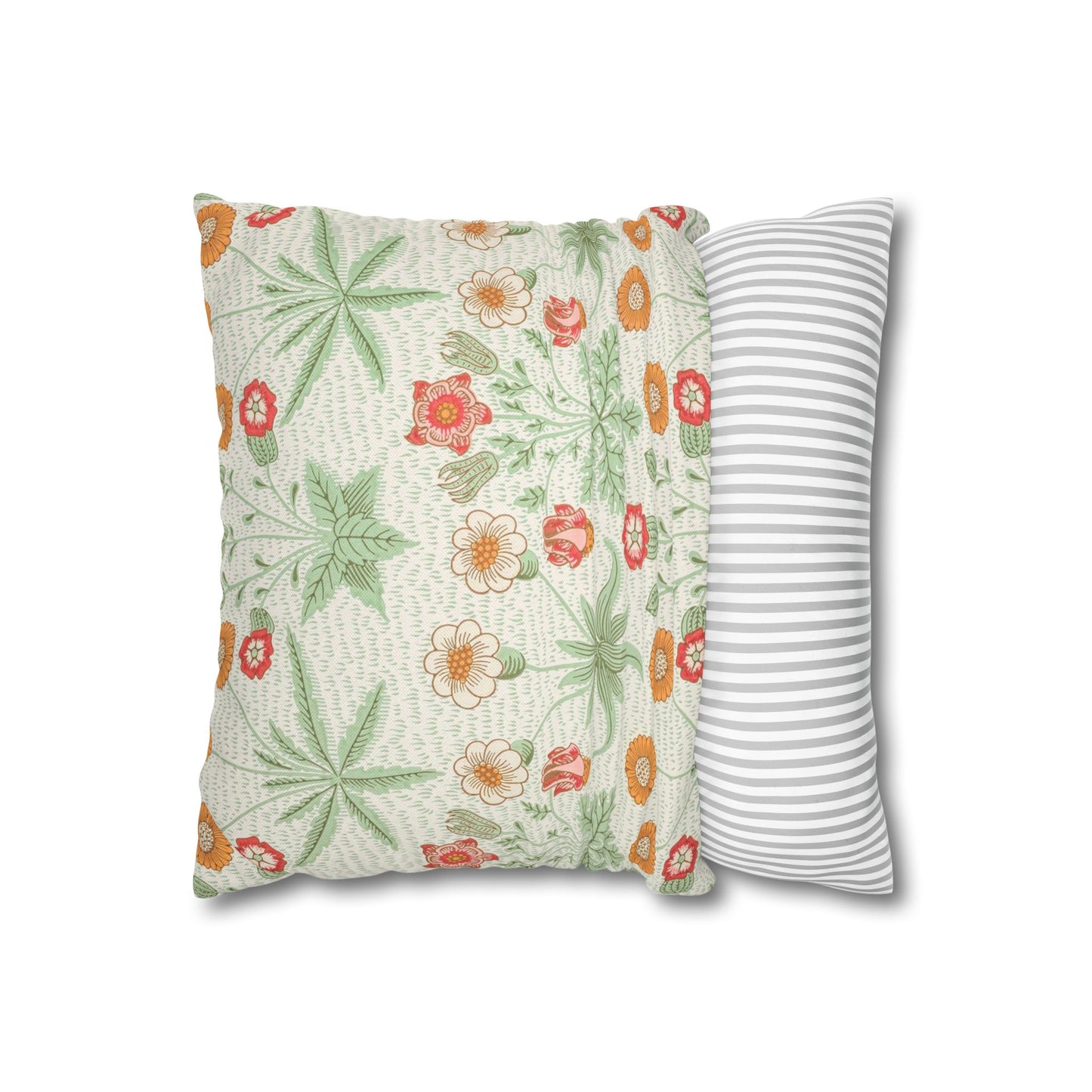Floral-patterned pillow and a striped pillow on a white background