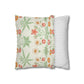 Two pillows, one with floral pattern and the other with stripes, on a white background.