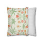 Two pillows, one with floral pattern and the other with stripes, on a white background.
