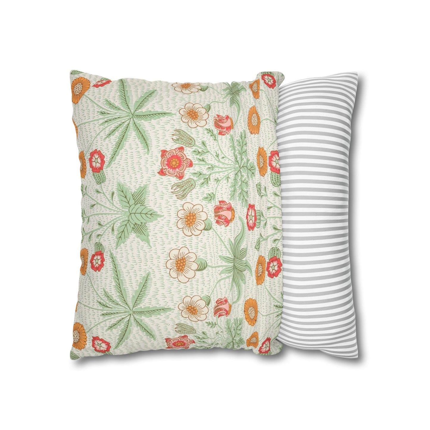Two pillows, one with floral pattern and the other with stripes, on a white background.