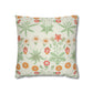 Decorative pillow with floral pattern on a white background