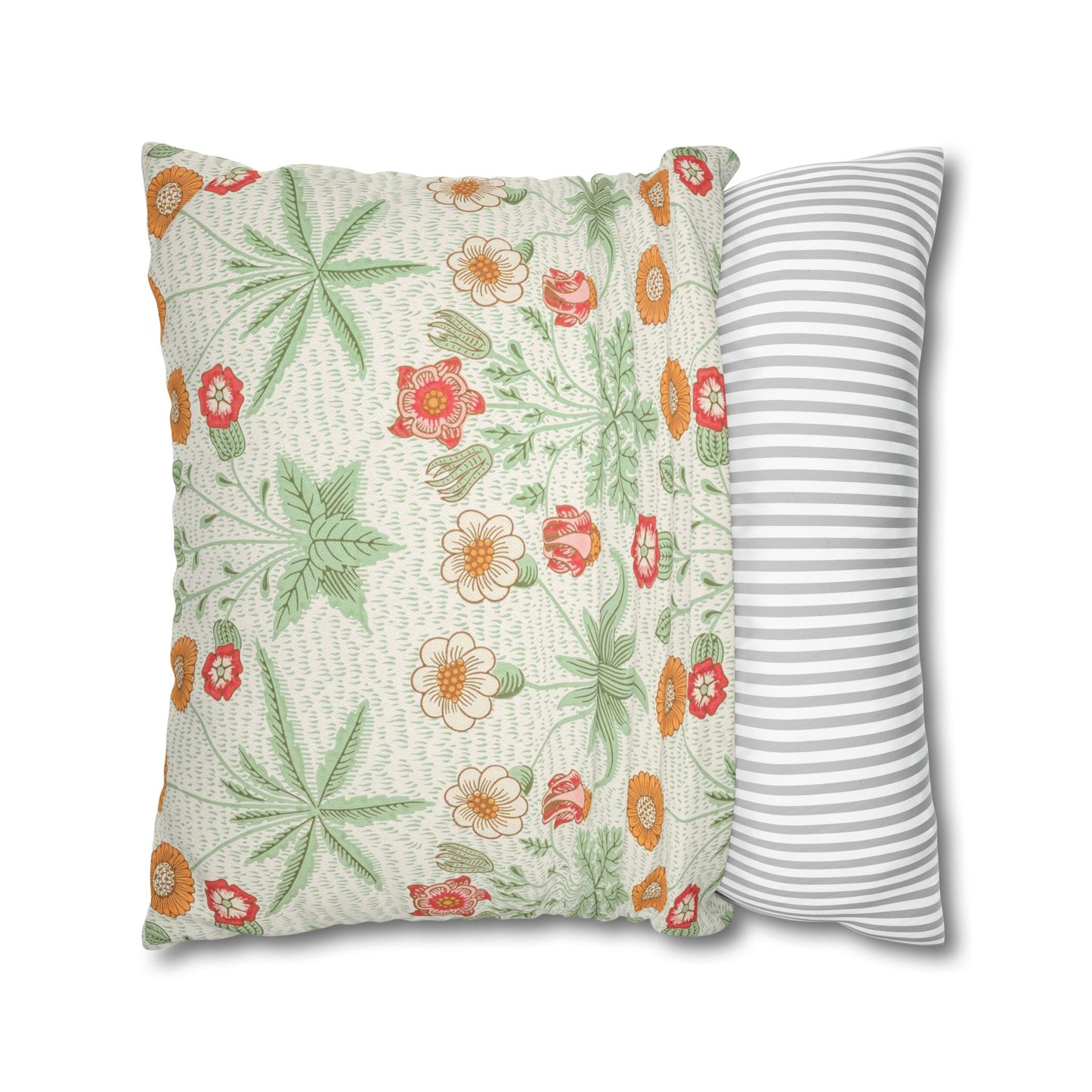 Floral-patterned pillow and a striped pillow on a white background