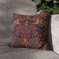 Decorative pillow with a colorful pattern on a gray couch