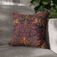 Decorative pillow with a floral pattern on a gray sofa