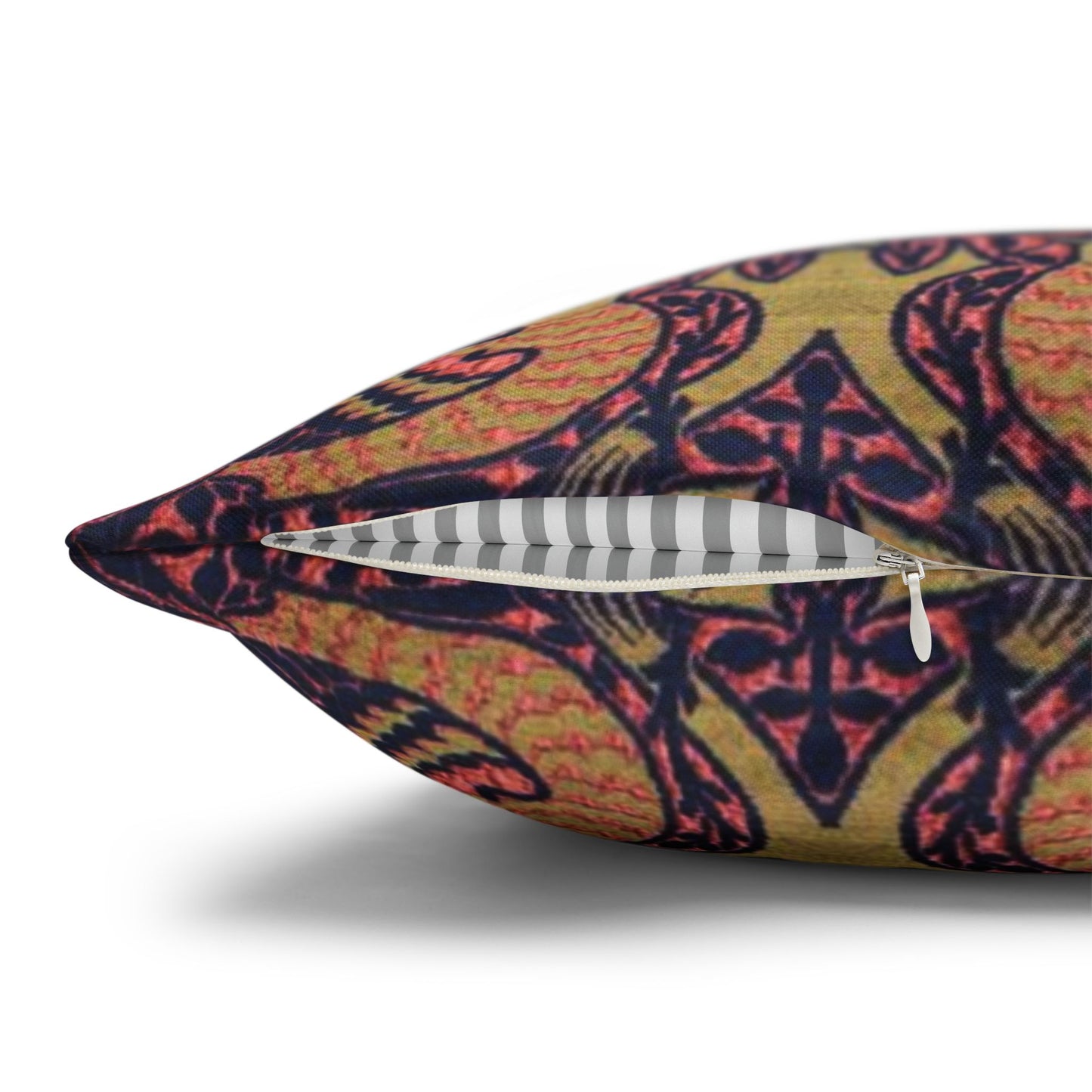 Decorative pillow with a colorful geometric pattern on a white background